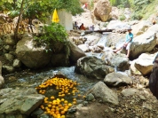 On the way to a waterfall we saw this ingenious way of keeping oranges cool by putting them in the cold water. We did the same thing with our water bottles when we arrived at the top.